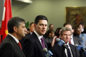UN Photo / Mark Garten David Miliband (centre), Secretary of State for Foreign and Commonwealth Affairs of the United Kingdom of Great Britain and Northern Ireland, addresses correspondents following a Security Council meeting on the situation in the Middle East. From left to right: Michael Spindelegger, Federal Minister for European and International Affairs of Austria; Mr. Miliband; and Bernard Kouchner, Minister for Foreign Affairs of France. 11 May 2009.